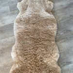 Alpakafell Sitzauflage Boden